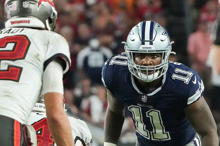 Dallas Cowboys linebacker Micah Parsons (11) eyes Tampa Bay Buccaneers quarterback Tom Brady (12) before a snap during the second half at Raymond James Stadium on Thursday, Sept. 9, 2021, in Tampa, Florida. (Smiley N. Pool/The Dallas Morning News/TNS)
