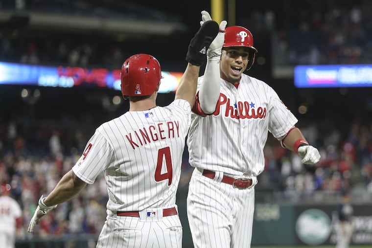 Aaron Altherr celebrates his two-run homer against the Braves with Scott Kingery in the seventh inning of the Phillies’ 3-0 win Monday night at Citizens Bank Park.