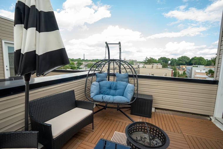 A rooftop deck is one of amenities Murchison was seeking in his new home. He got it.