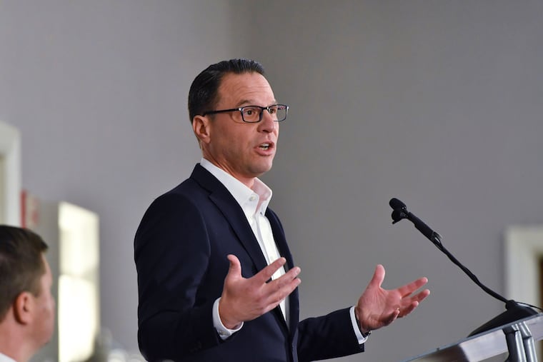 Pennsylvania Gov. Josh Shapiro speaks during an appearance at the Pennsylvania Press Club in November. He signed the final pieces of the state budget into law Wednesday night.