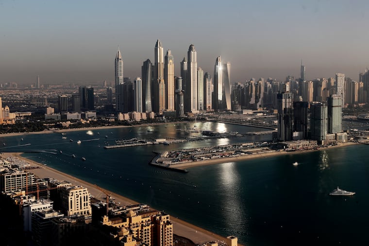 The skyline in the Marina district, center, and the new Dubai Harbour development, right, are seen from the observation deck of "The View at The Palm Jumeirah" in Dubai, United Arab Emirates, on April 6, 2021.