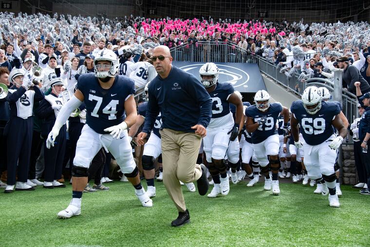 In this Oct. 5, 2019, file photo, Penn State head coach James Franklin leads his team onto the field for their game against Purdue.
