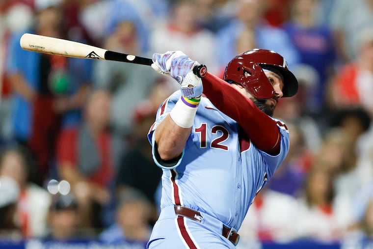 Phillies designated hitter Kyle Schwarber smacks a three-run homer in the seventh inning against the Atlanta Braves.