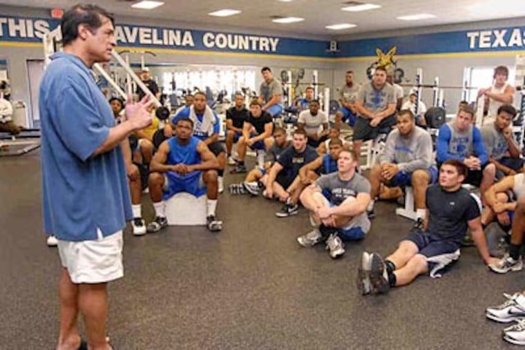 Juan Castillo talks to members of the Texas A&M-Kingsville football team. (Paul Iverson/For the Daily News)