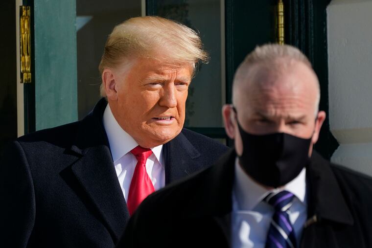 President Donald Trump walks to board Marine One at the White House on his way to Texas on Tuesday.