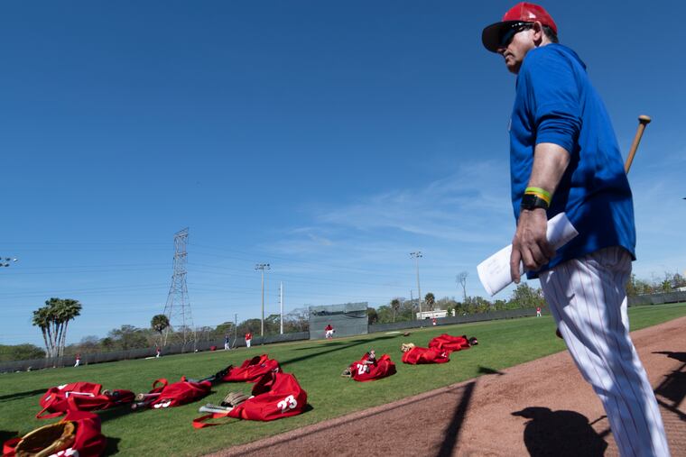 Phillies manager Rob Thomson looks on during the first full-squad workouts on Tuesday in Clearwater, Fla.