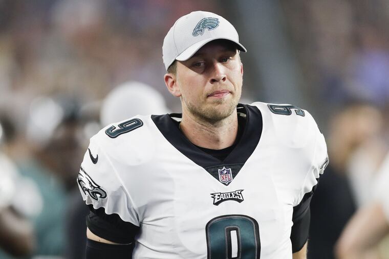 Eagles quarterback Nick Foles on the sidelines after fumbling the football against the New England Patriots during a preseason game at Gillette Stadium in Foxborough, MA on Thursday, August 16, 2018. The Patriots scored a defensive touchdown on the fumble. YONG KIM / Staff Photographer