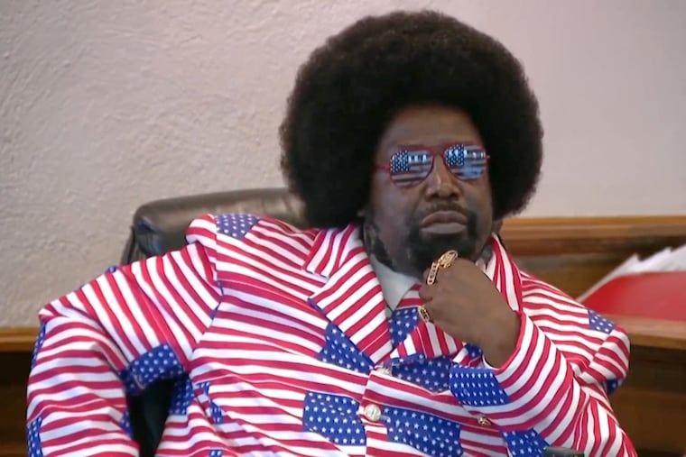 CORRECTS LOCATION: In this image taken from video, rap artist Afroman testifies in court on Tuesday, March 17, 2026, in West Union, Ohio. (WCPO via AP)