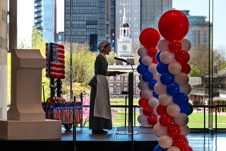 First Lady Abigail Adams, portrayed by Johanna Dunphy, introduces city officials, historical and cultural leaders to start a press conference at the National Constitution Center Tuesday, Apr. 8, 2025 announcing 52 Weeks of Firsts. In honor of the Semiquincentennial, the Philadelphia Historic District will celebrate 52 weeks of Philly firsts in 2026. Each week throughout the year, the citywide celebration will honor everything from the first African American Methodist Episcopal Church, first Flower Show, first American flag, first zoo, first Children’s Hospital, first penitentiary, first Thanksgiving parade and first slinky.