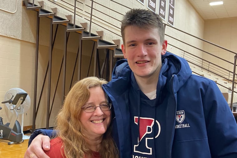 Former Penn star AJ Brodeur and his mother Jerri, who never missed a game he played at Penn, and he played in them all.