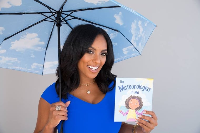 Brittney Shipp returns to NBC10. Here, she holds her children's book, The Meteorologist in Me.