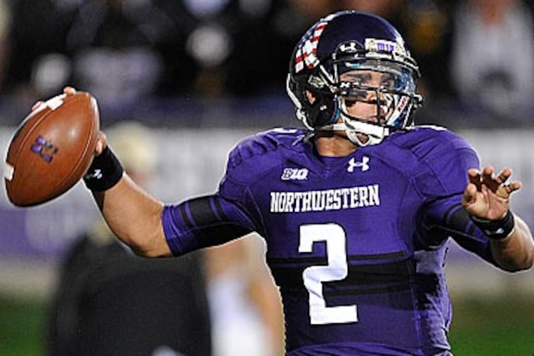 In addition to his passing, Kain Colter ran 14 times for 161 yards and caught nine passes for 131 yards last week. (Jim Prisching/AP)