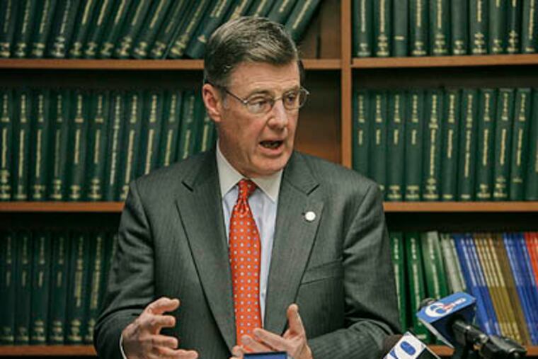 Camden County Prosecutor Warren Faulk speaks at a press conference at his office after a Camden police officer pleaded guilty to a conspiracy charge Friday morning, saying he and other officers planted drugs and falsified information in order to make drug arrests. (Akira Suwa / Staff Photographer)