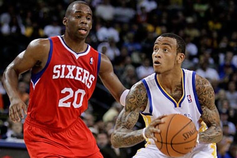 "We were just a step behind and they took advantage," 76ers coach Doug Collins said of his team's loss. (Ben Margot/AP)