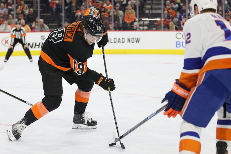 The Flyers' Nolan Patrick, shown battling the New York Islanders' Josh Bailey for the puck in a game last season, could be a part of the team's practices on a full-time basis next week.