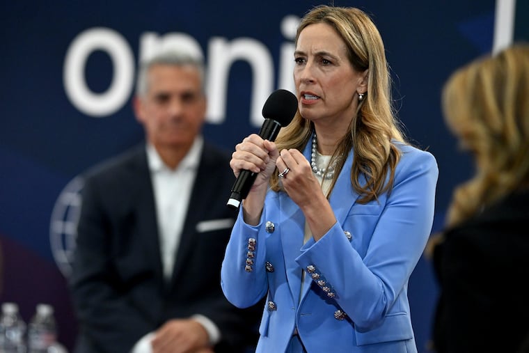 New Jersey candidate for governor Democrat Mikie Sherrill during a Sept. 21 debate with Republican Jack Ciattarelli (rear) at Rider University.