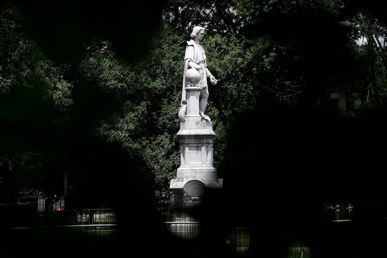 A statue of Christopher Columbus stands at Marconi Plaza, Monday, June 15, 2020, in the South Philadelphia neighborhood of Philadelphia. (AP Photo/Matt Slocum)