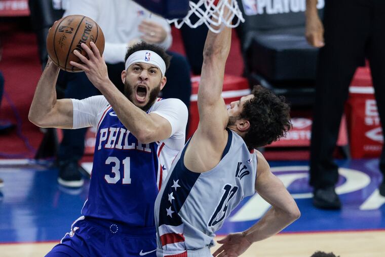 Seth Curry, here shooting over the Wizards' Raul Neto, scored 30 points in the close-out Game 5 win.