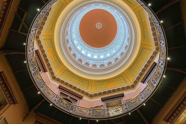 The rotunda at New Jersey's statehouse, along with new lighting, has been spruced up with a new coat of paint to match the way the building looked more than 100 years ago. The building has been reopened and reoccupied by the governor's and other executive staff after a nearly six year, $300-million renovation.