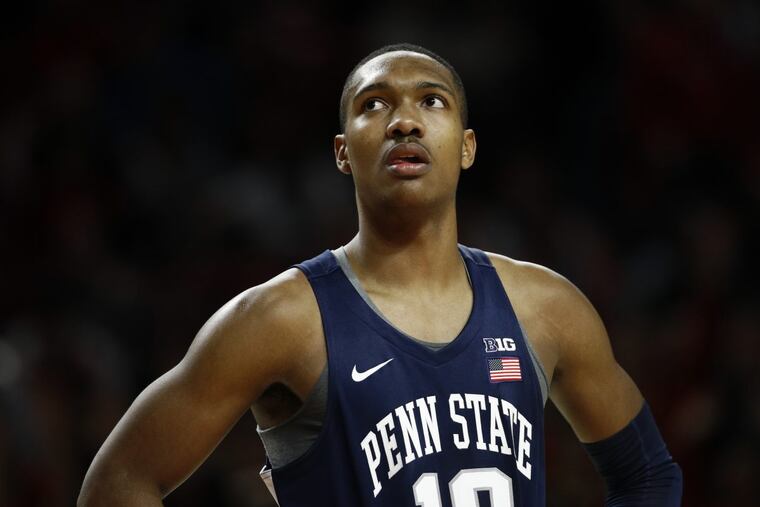 Penn State guard Tony Carr , a Roman Catholic grad, watches a free throw. The Nittany Lions are 2-3 in the Big Ten.