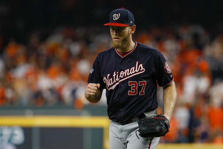 Washington Nationals starting pitcher Stephen Strasburg reacts after Houston Astros' Michael Brantley grounded out to end the fifth inning of Game 6.