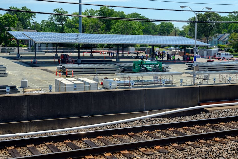 Solar panels can be seen from the train platform after a press conference announcing the DRPA and PATCO's clean energy initiative, at the PATCO Ashland Station in Voorhees.