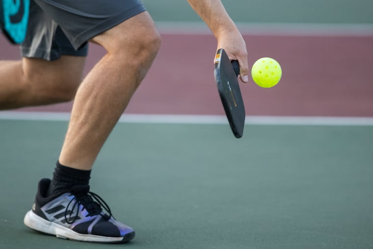 A pickleball player in Chestnut Hill. Some residents in Lower Merion are not happy with proposed courts.