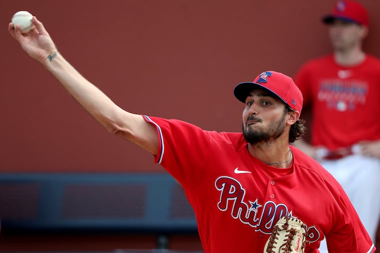 Zach Eflin pitches a bullpen session during Phillies spring training in Clearwater.