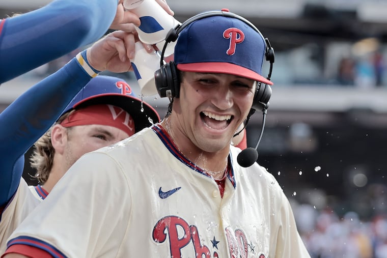 Phillies pitcher Tyler Phillips gets the celebratory cold water bath after the Phillies defeated the Oakland Athletics on Saturday in what was Phillips' first MLB start.