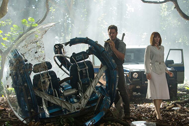 Chris Pratt, left, and Bryce Dallas Howard in a scene from the film, "Jurassic World," directed by Colin Trevorrow. (Chuck Zlotnick/Universal Pictures via AP)