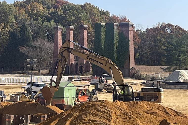 Five stacks that once vented varnish-making operations at the former Lucas, later Sherwin-Williams, paintworks adjacent to Silver Lake in Gibbsboro, NJ. Contaminated soil in the foreground is being excavated to a depth of 25 feet and removed from the site.