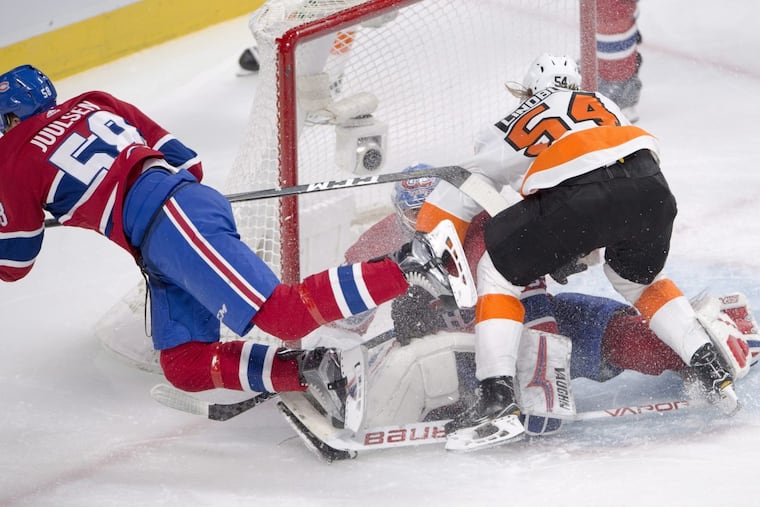 Oskar Lindblom (54) crashes the net in a recent game against Montreal. The rookie left winger has been a responsible two-way player, but has yet to collect a point in 11 games with the Flyers.