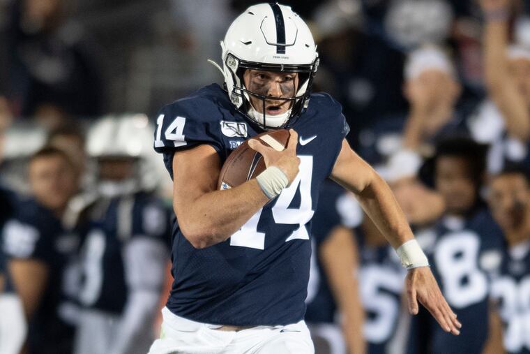 Penn State quarterback Sean Clifford (14) sprints on a long gain in the third quarter of an NCAA college football game in State College, Pa., on Saturday, Sept. 7, 2019. (AP Photo/Barry Reeger)