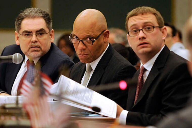 Superintendent William R. Hite Jr. (center) said: "A building with teachers and principals, but no other supports? That's not a picture of a school to me"