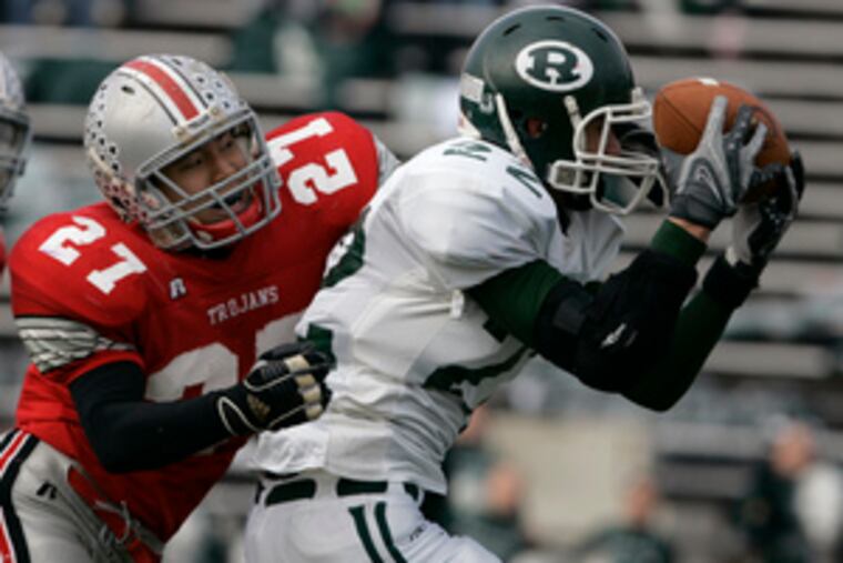 Receiver Jake Cahill scores Ridley's first touchdown on a 28-yard pass reception in the second quarter. Parkland cornerback Sam Tajiri (left) defends on the play.