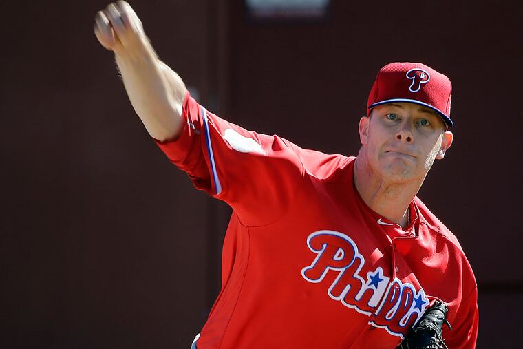Philadelphia Phillies pitcher Andrew Bailey throws in the bullpen during a spring training baseball workout Sunday, Feb. 21, 2016, in Clearwater, Fla.