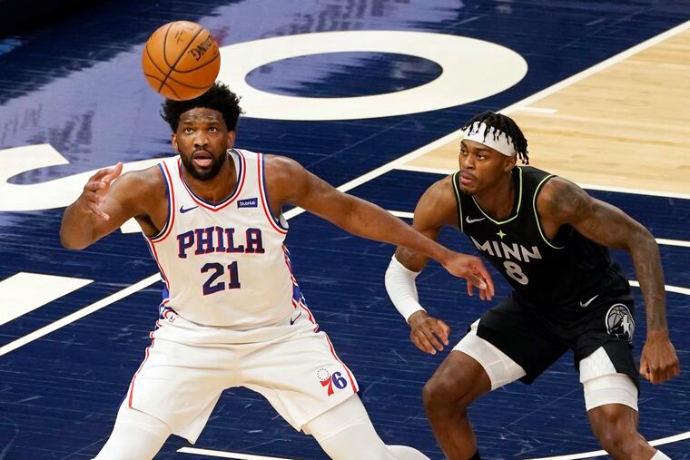Joel Embiid, left, delivered 37 points and 11 rebounds in the Sixers' win