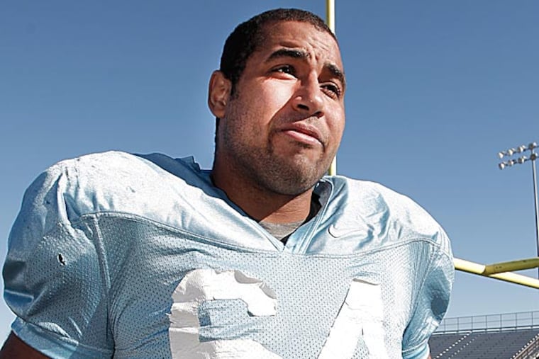 A few quick hits on John Urschel's resume: All-Big Ten football player, 4.0 grade-point average at graduation, math teacher at Penn State. (Brandon Wade/AP)