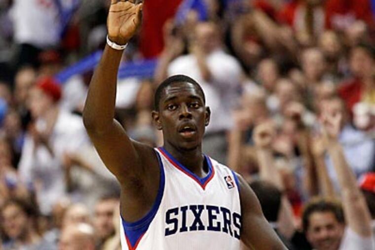 Jrue Holiday celebrates after hitting a three-pointer during the Sixers' win over the Bulls. (Yong Kim/Staff Photographer)