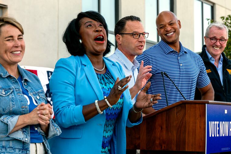 Pennsylvania Gov. Josh Shapiro (center) gets a reaction from Philadelphia Mayor Cherelle L. Parker (second from left) and his fellow Democratic governors (from left) Maura Healey of Massachusetts; Wes Moore of Maryland; and Phil Murphy of New Jersey, as he speaks during a rally for Kamala Harris in North Philadelphia in October.