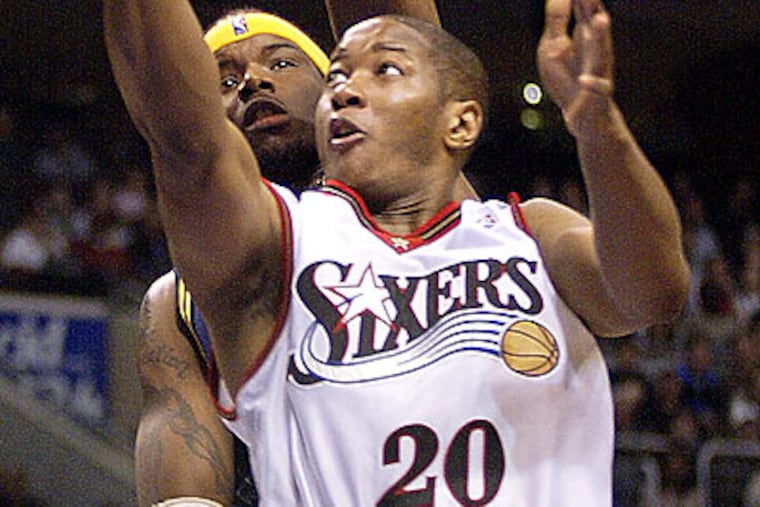 Former 76ers player Eric Snow is back with the team as a television analyst. (H. Rumph Jr/AP file photo)