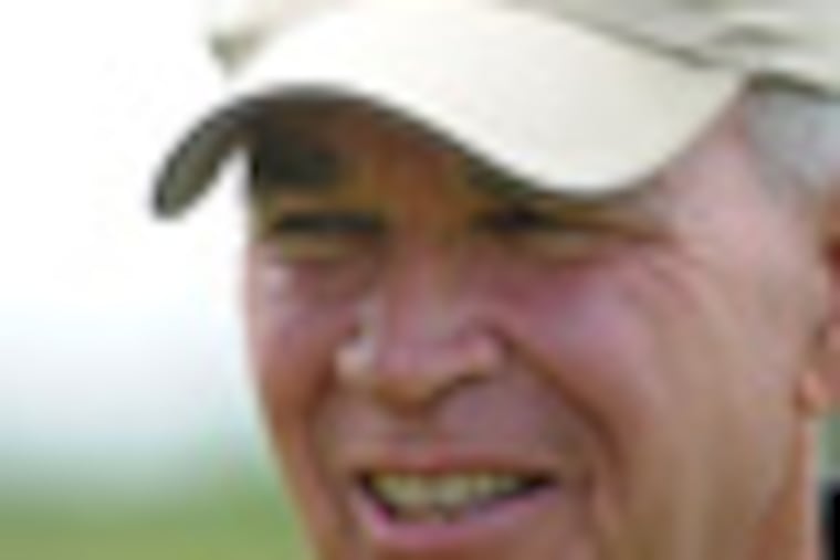 Bill Haines Jr. (cq) in one of his bogs July 9, 2012. He grew up farming cranberries in New Jersey's Pinelands, just as his father did. He knows it intimately - and has the largest single operation in the state, believed to be largest in the nation, started by his great-grandgather in the 1890s. ( TOM GRALISH / Staff Photographer )