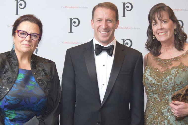 Allison Vulgamore (left), orchestra president and CEO, with co-chairs Gary Frank and Dianne Rotwitt, in happier times.