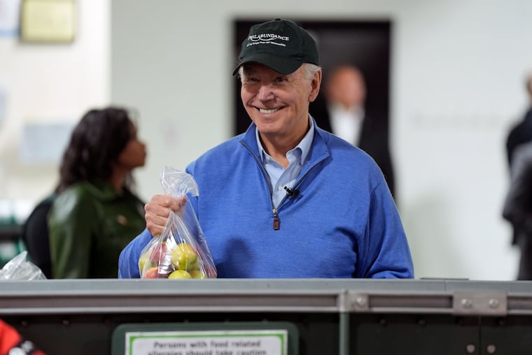 President Joe Biden volunteers at Philabundance, a hunger relief organization, to mark Martin Luther King, Jr. Day on Monday.