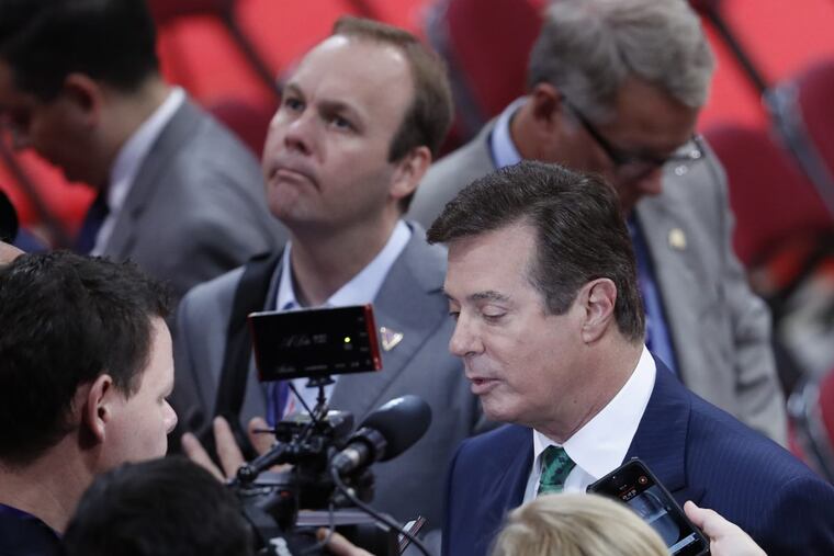 Paul Manafort at the 2016 Republican National Convention in Cleveland. Rick Gates is at center rear. Both were indicted Monday.