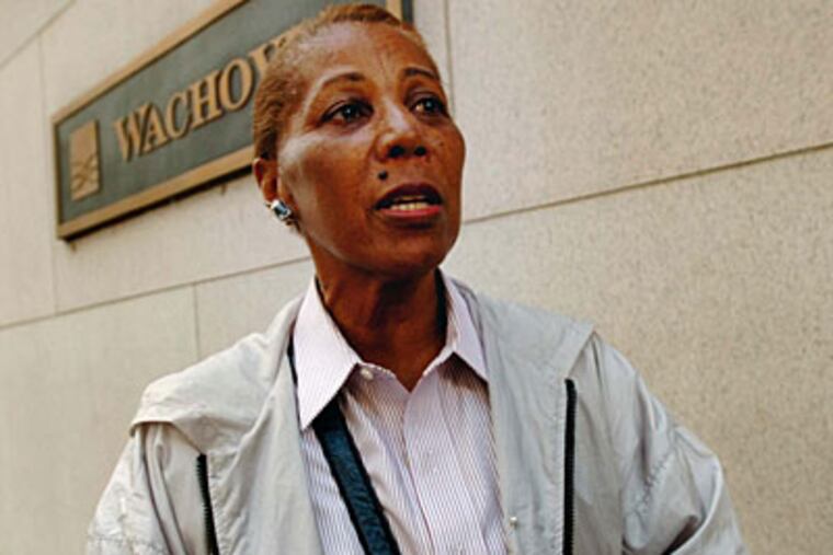 Hazel Gilstrop, 67, of Center City, took her savings out of a Wachovia branch on S. Broad St. "I'm just an average person with little retirement savings. It's a mess for me," she said. (Clem Murray / Inquirer)