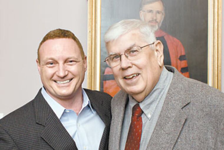 Dr. Marque Allen, left, and his mentor Richard Meagher at Rowan University. (Ed Hille / Staff Photographer)