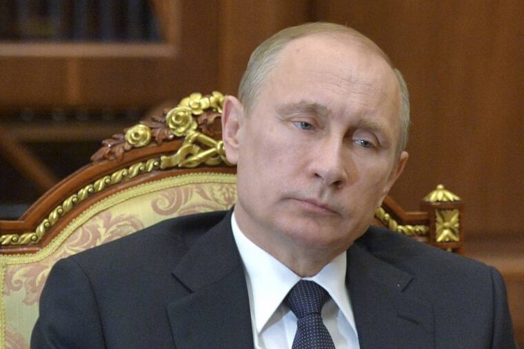 Russian President Vladimir Putin meets with the regional leader of Karelia in the Kremlin in Moscow, Russia, Wednesday, March 11, 2015. (AP Photo/RIA-Novosti, Alexei Druzhinin, Presidential Press Service)