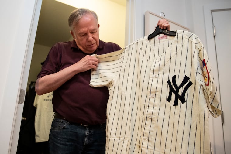 Peter Capolino, founder of Mitchell & Ness, talks about a Mickey Mantle replica jersey at his home in Philadelphia on April 25. Capolino took over the sporting goods store called Mitchell & Ness from his father, and started Mitchell & Ness Nostalgic Company in the late 80s.