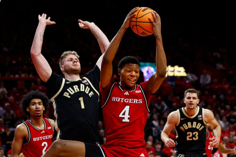 Rutgers guard Ace Bailey is fouled by Purdue forward Caleb Furst (1) in a game on Jan. 9.